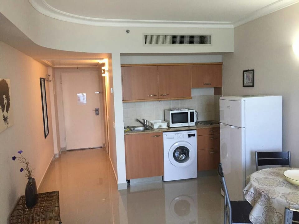 Family Apartment, 1 Bedroom, Sea View, Beachfront | Private kitchen | Fridge, microwave, stovetop, coffee/tea maker