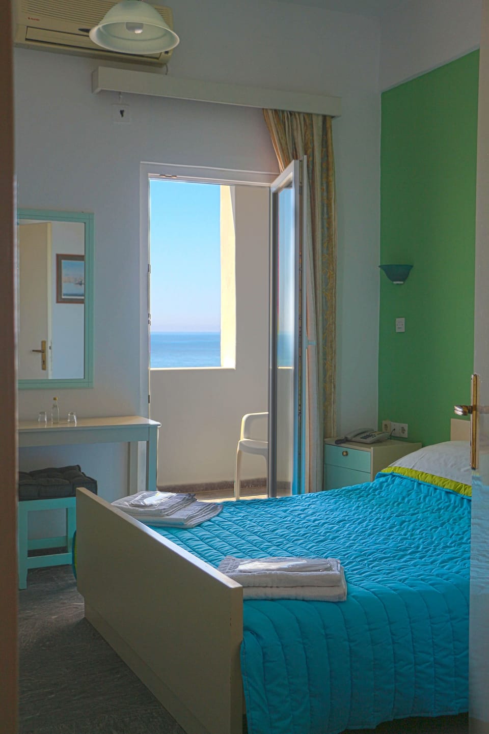 Triple Room, Sea View | Minibar, in-room safe, soundproofing, free WiFi