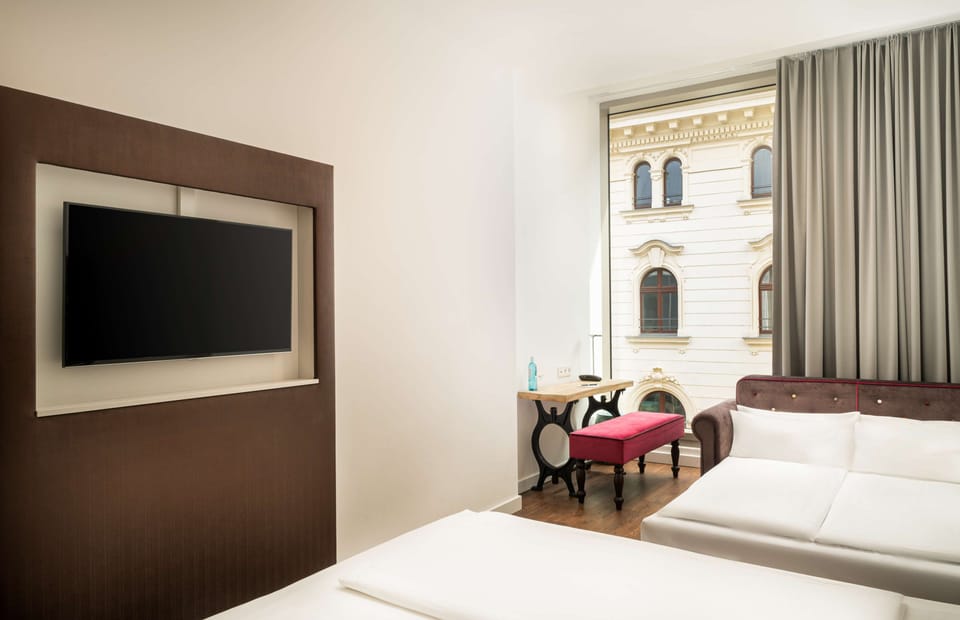 Standard Quadruple Room | In-room safe, desk, soundproofing, iron/ironing board