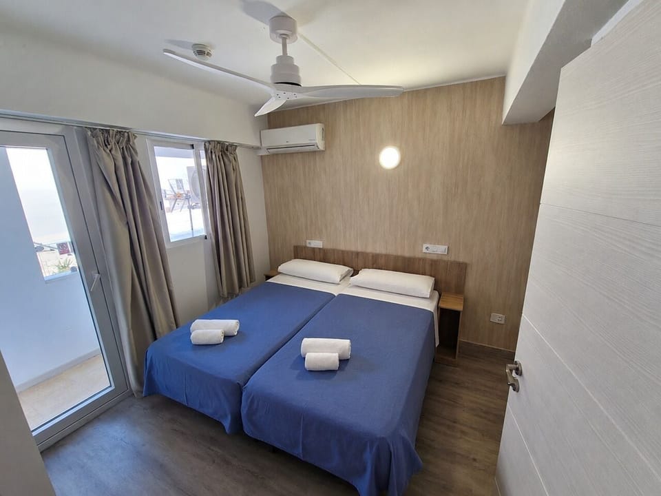 Economy Room, Private Bathroom | In-room safe, individually furnished, blackout drapes, free WiFi