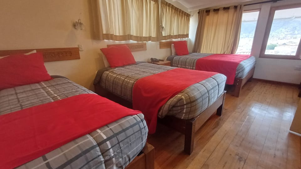 Triple Room | Down comforters, desk, free WiFi, bed sheets