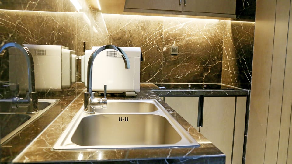 1 King Bed Executive Suite | Private kitchenette | Coffee/tea maker, electric kettle