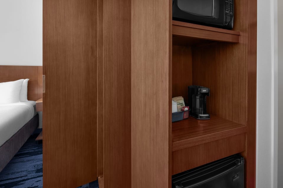 Premium bedding, desk, blackout drapes, soundproofing