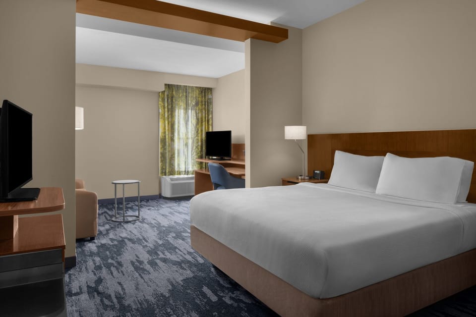 Premium bedding, desk, blackout drapes, soundproofing