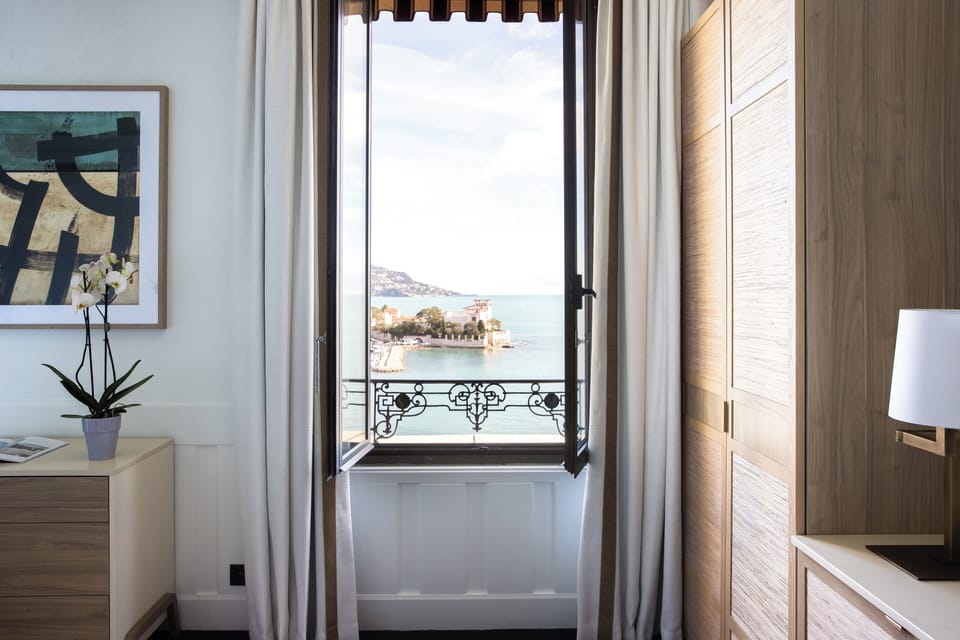 Deluxe sea and garden view room | View from property