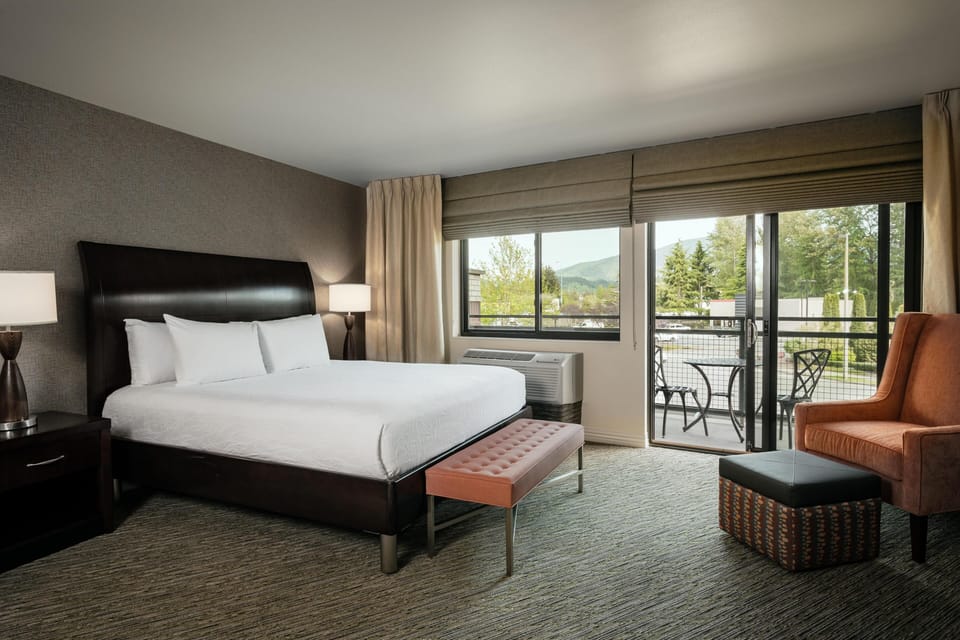 Suite, Accessible | Living area | 32-inch flat-screen TV with cable channels, TV, DVD player