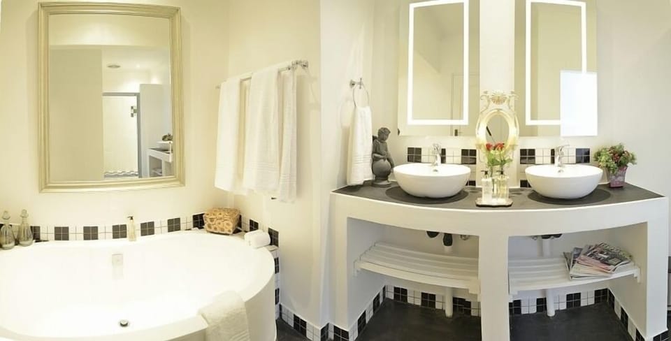 Designer toiletries, hair dryer, bathrobes, towels