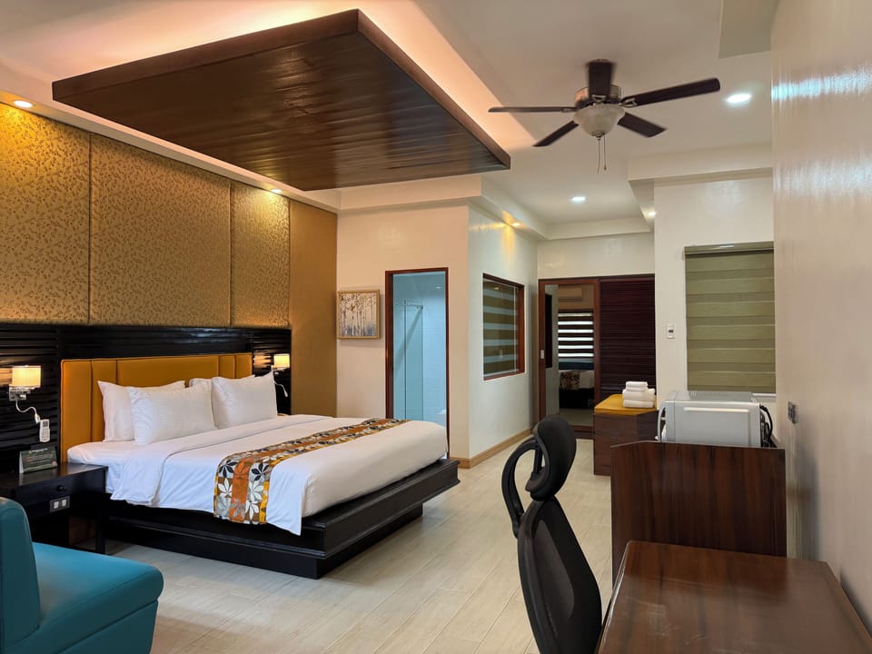 Deluxe Room, Poolside | Premium bedding, in-room safe, desk, laptop workspace