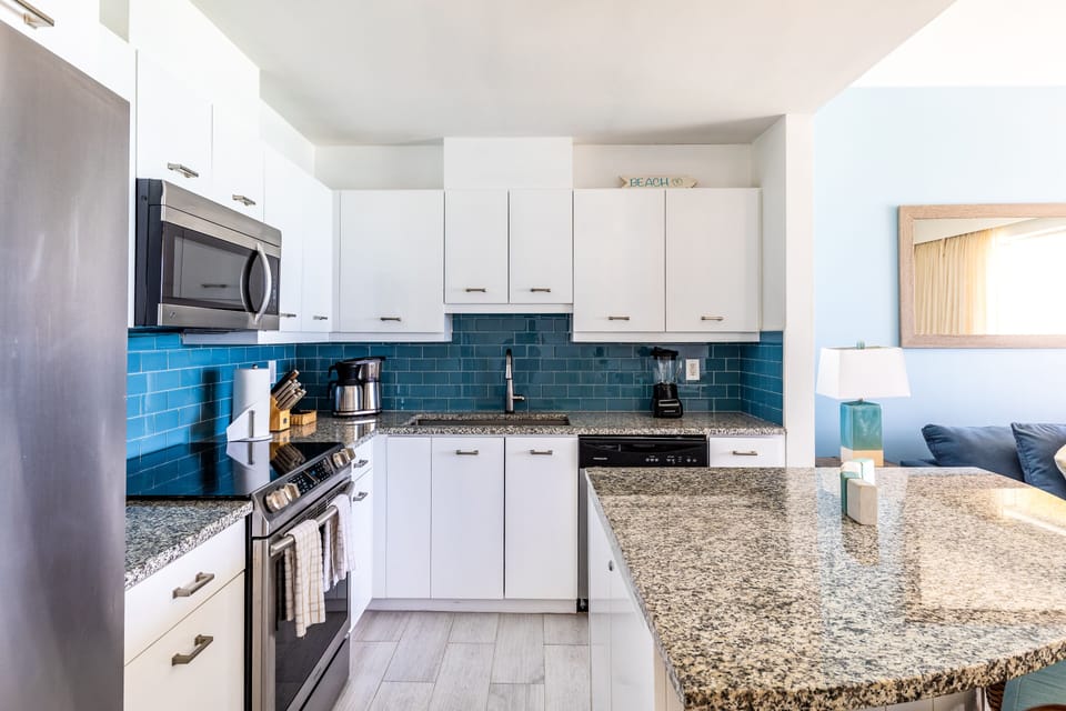 1-Bedroom Oceanfront (4303) | Private kitchen | Coffee/tea maker, full-size fridge, microwave, oven