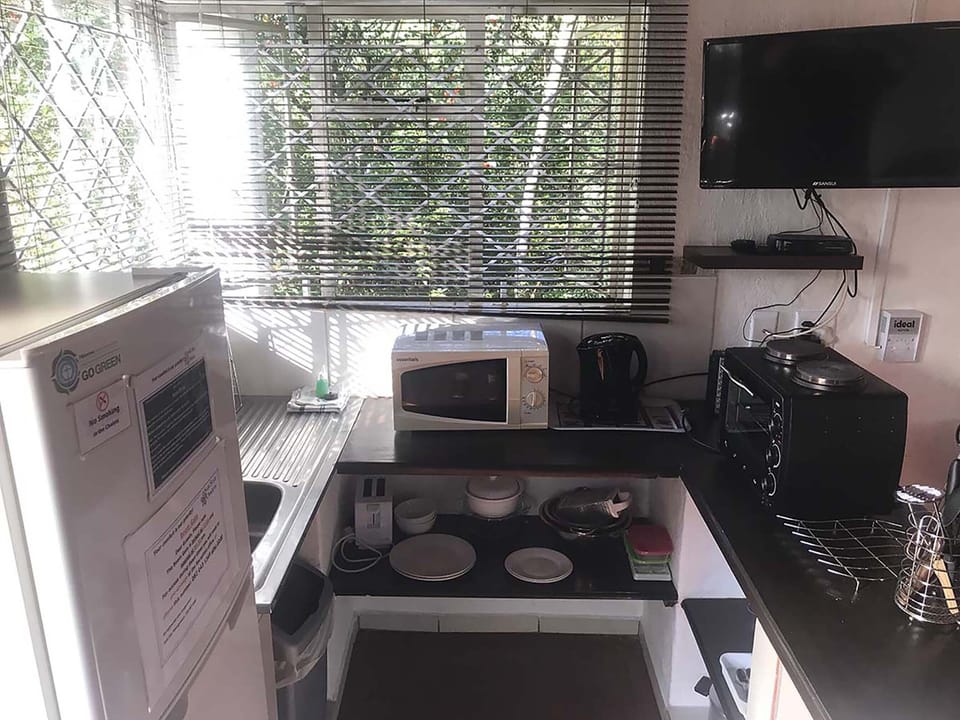 Standard Chalet (2 Berth) | Private kitchen | Coffee/tea maker, full-size fridge, microwave, electric kettle