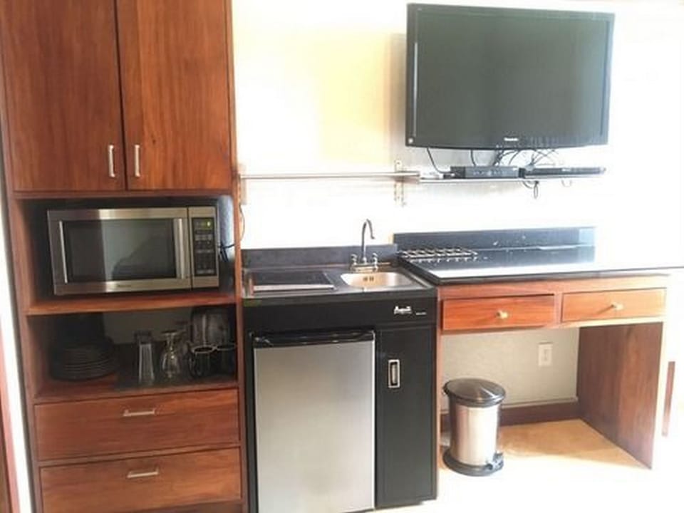 Standard Suite, Balcony, Ground Floor | Premium bedding, in-room safe, laptop workspace, blackout drapes