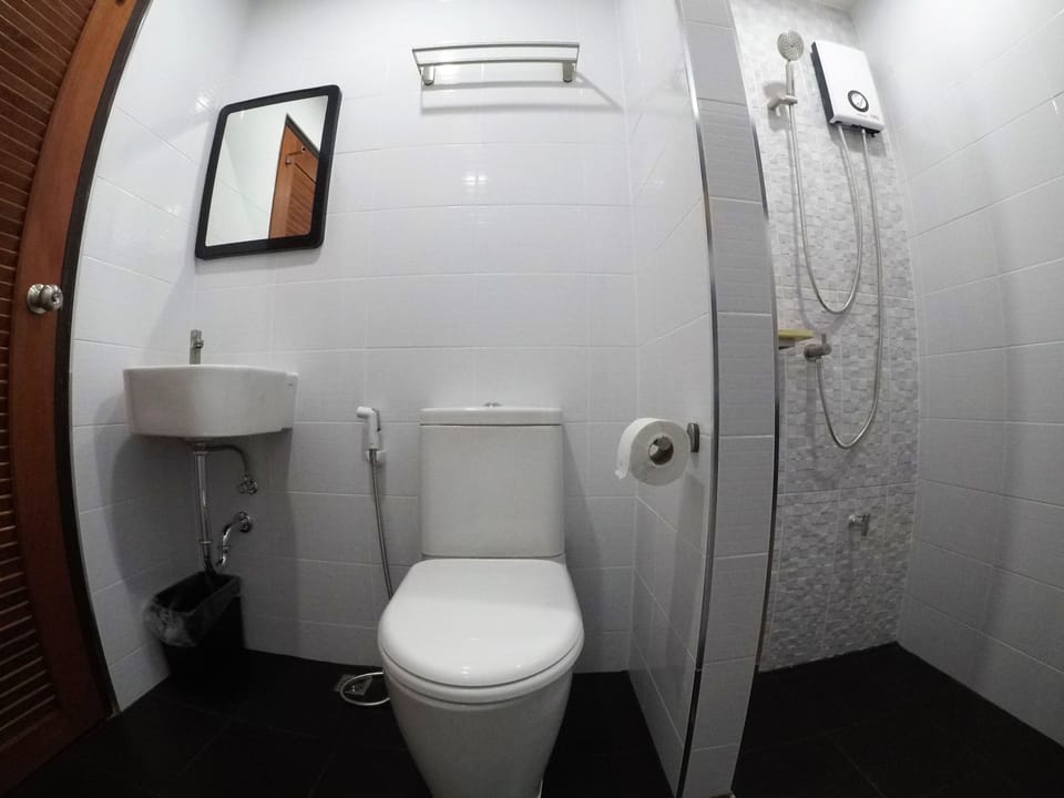 Shower, free toiletries, hair dryer, slippers