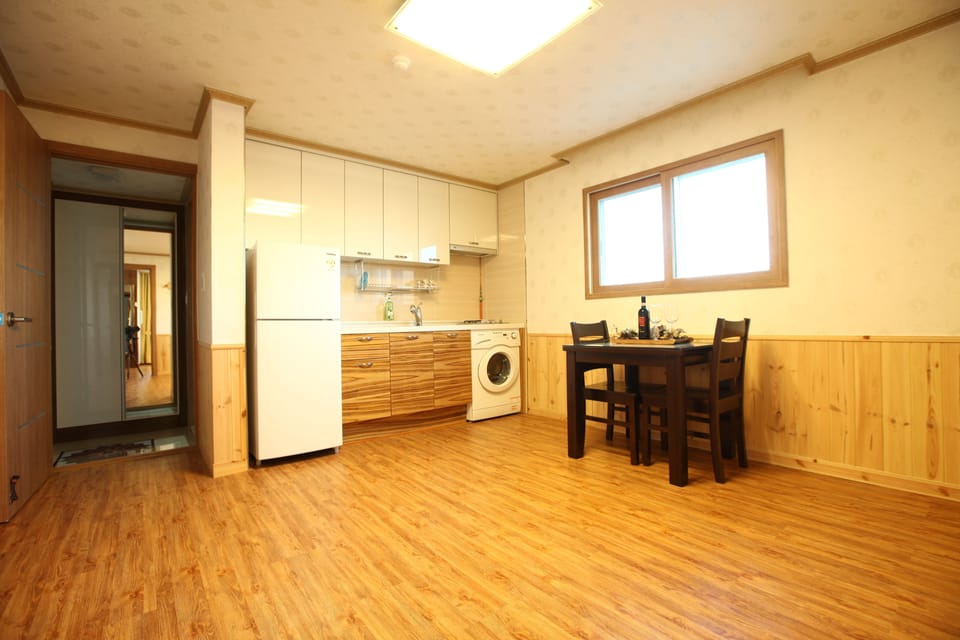 Halla Family Room | Private kitchen | Full-size fridge, stovetop, coffee/tea maker, electric kettle