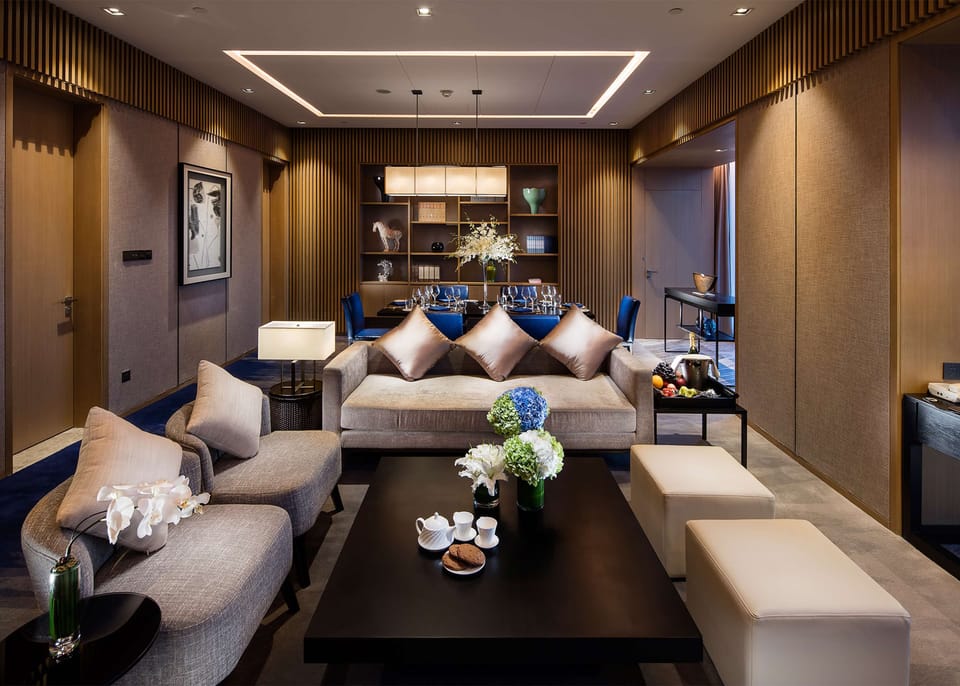 Suite, 1 King Bed | Living area | 42-inch LCD TV with satellite channels, TV