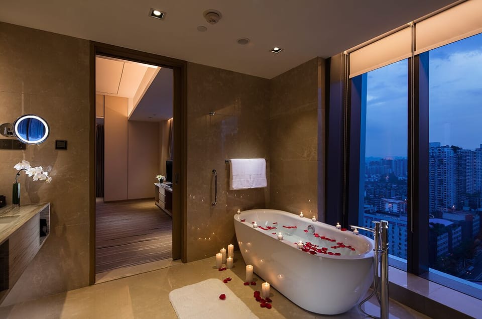 Executive Suite, 1 King Bed | Bathroom | Separate tub and shower, deep soaking tub, rainfall showerhead