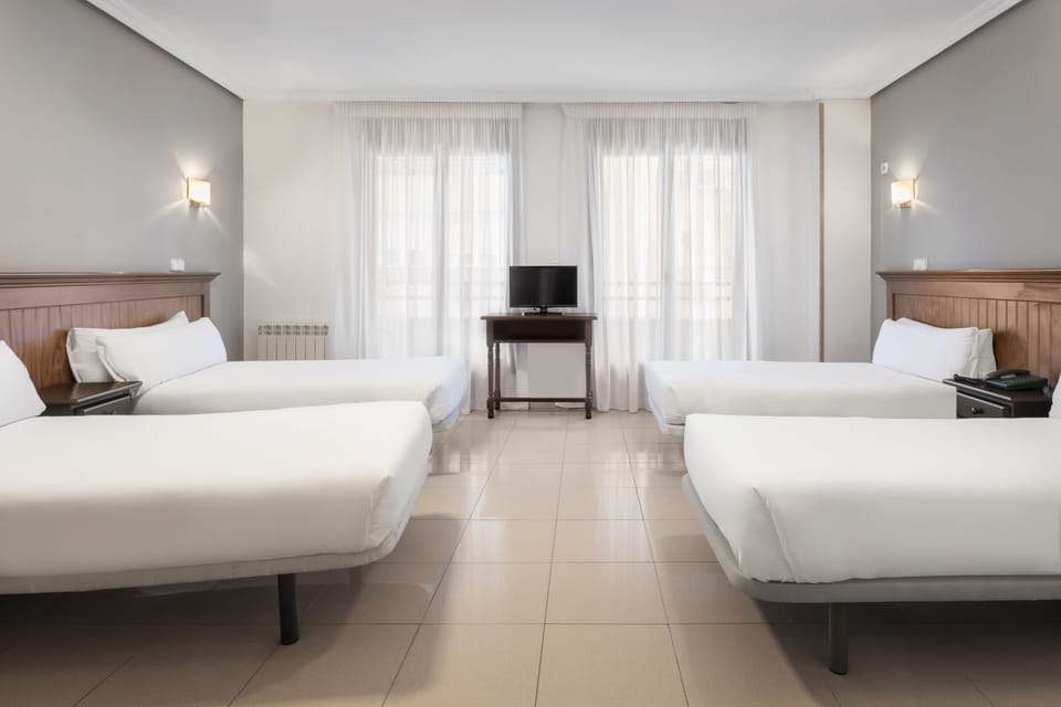 Desk, blackout drapes, free WiFi, bed sheets