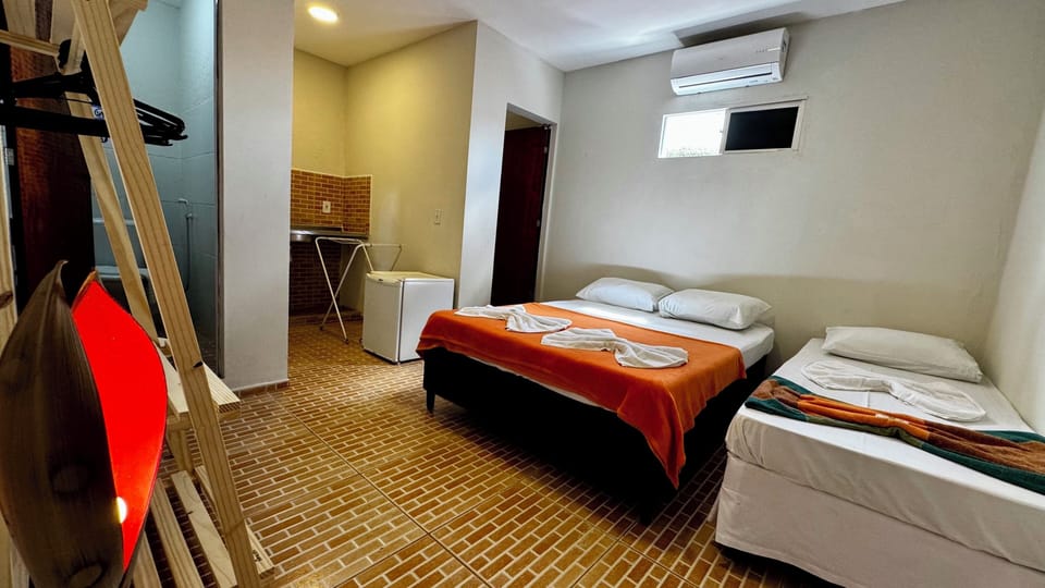 Suíte T | Blackout drapes, WiFi (free), individually decorated
