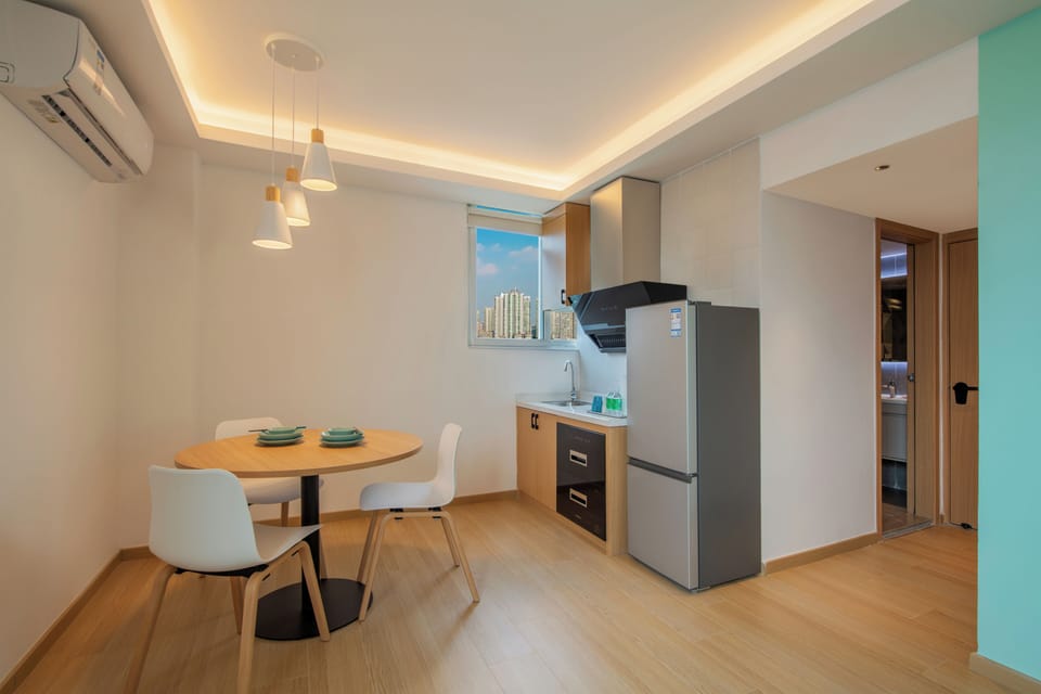 Deluxe Studio Suite | Living area | TV