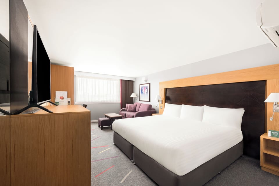 Standard Room, 1 Queen Bed with Sofa bed | 1 bedroom, in-room safe, desk, blackout drapes