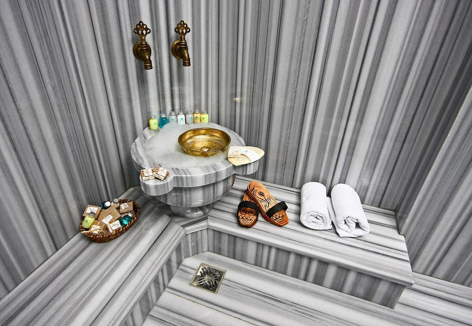 Shower, free toiletries, hair dryer, slippers