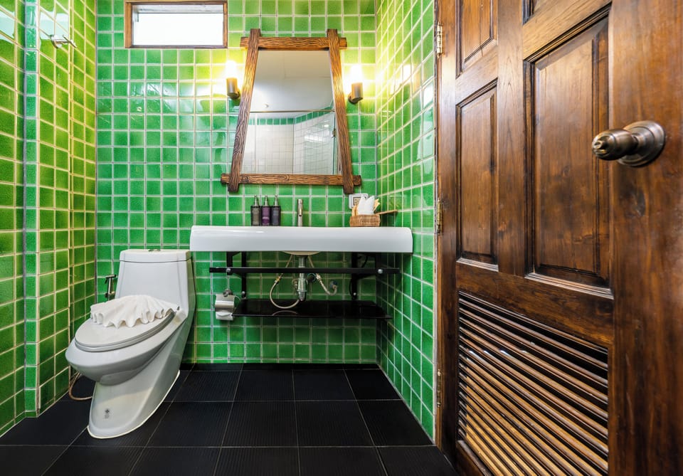 Deluxe Double Room, Pool View | Minibar, in-room safe, desk, laptop workspace