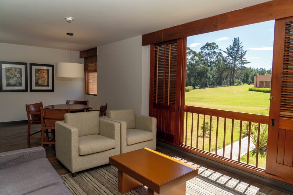 Standard Room, 2 Twin Beds | Living area | 32-inch LCD TV with cable channels, TV