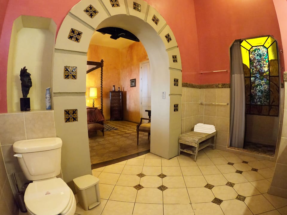 Grand Queen | Bathroom | Shower, free toiletries, hair dryer, bathrobes