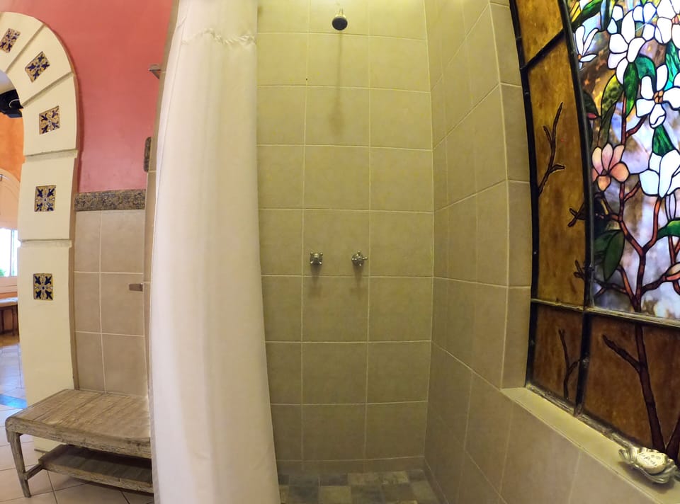 Grand Queen | Bathroom | Shower, free toiletries, hair dryer, bathrobes