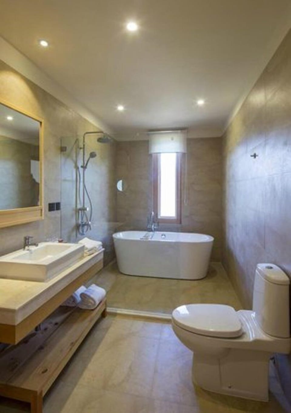 Separate tub and shower, deep soaking tub, free toiletries, slippers
