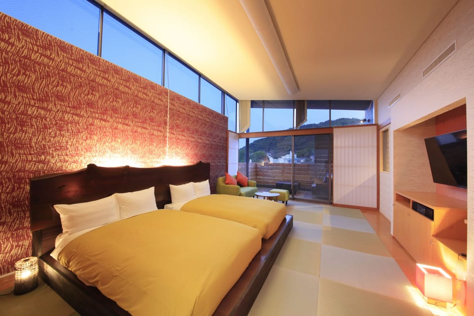 Japanese-Style Twin Room with Open-Air Bath and 2 Japanese Futons - 3rd Floor | Living room | Flat-screen TV