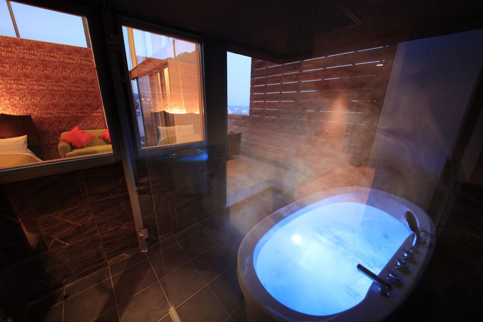 Japanese-Style Twin Room with Open-Air Bath and 2 Japanese Futons - Top Floor | Bathroom | Free toiletries, hair dryer, slippers, bidet