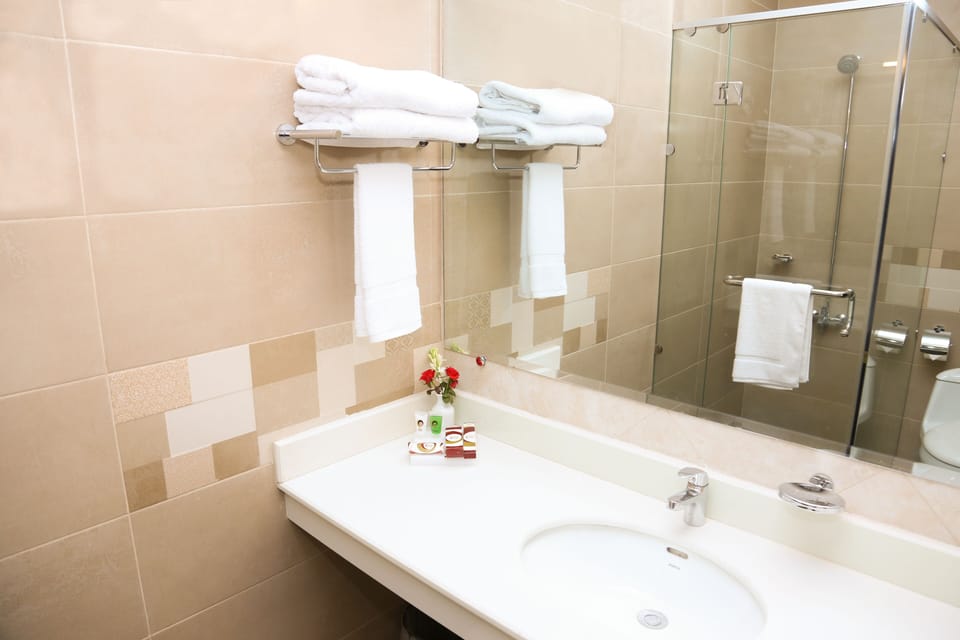 Shower, free toiletries, hair dryer, slippers