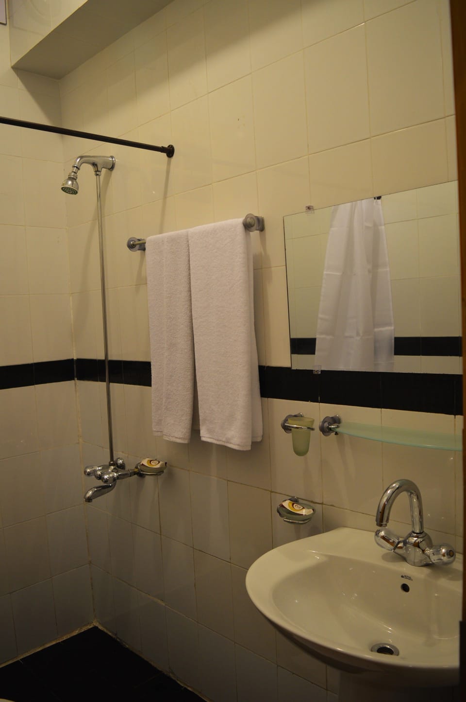 Shower, free toiletries, hair dryer, slippers