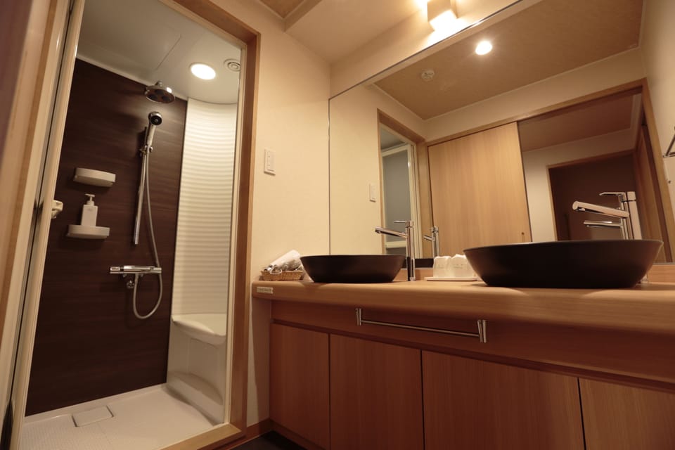 Free toiletries, hair dryer, slippers, electronic bidet