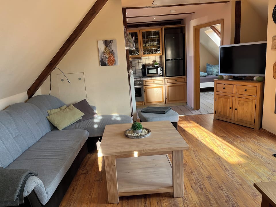 Basic Condo, 2 Bedrooms, Balcony | Living area | 120-cm flat-screen TV with satellite channels, TV