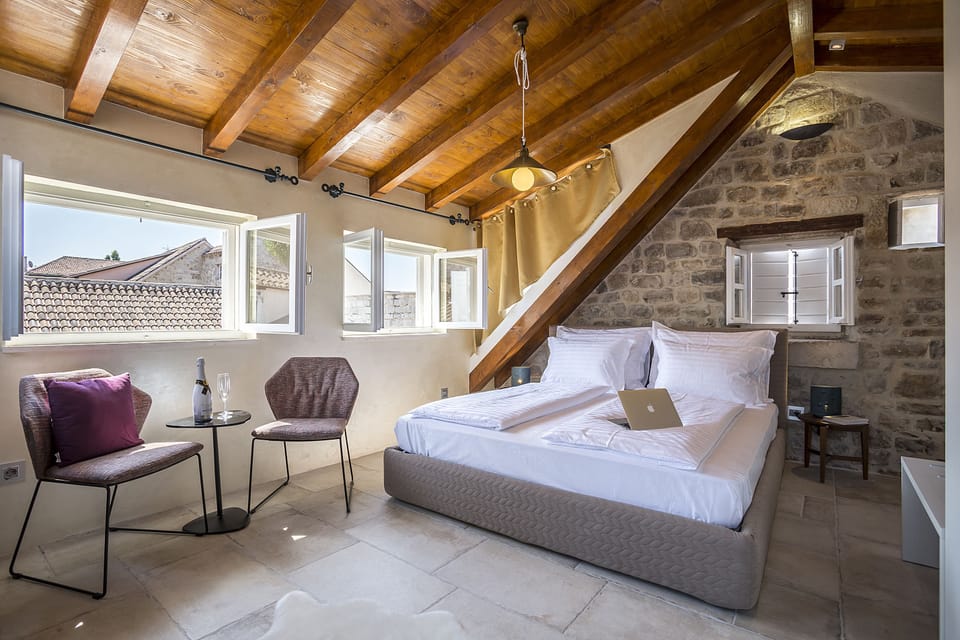 Superior Double Room, City View | Living area | Flat-screen TV