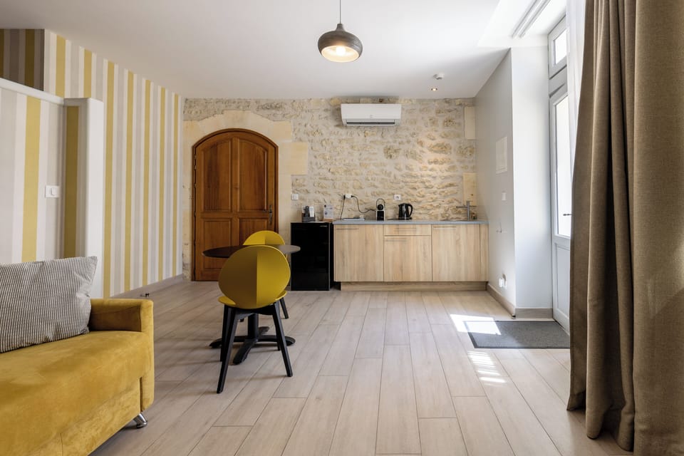 Suite, 1 Bedroom | Living area | Flat-screen TV