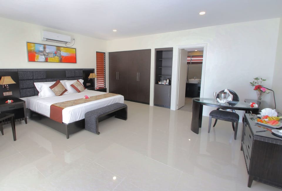 Garden View King Bed | Premium bedding, minibar, in-room safe, individually decorated