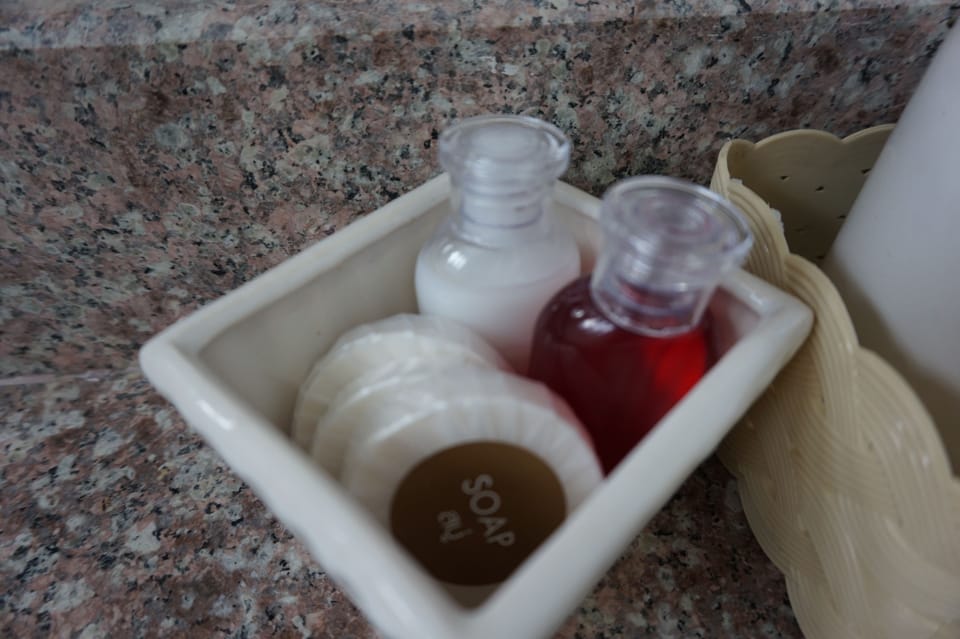 Shower, free toiletries, slippers, towels