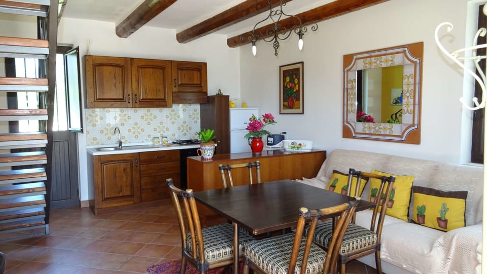Comfort Apartment, Kitchen, Garden View | Living area | Flat-screen TV, toys