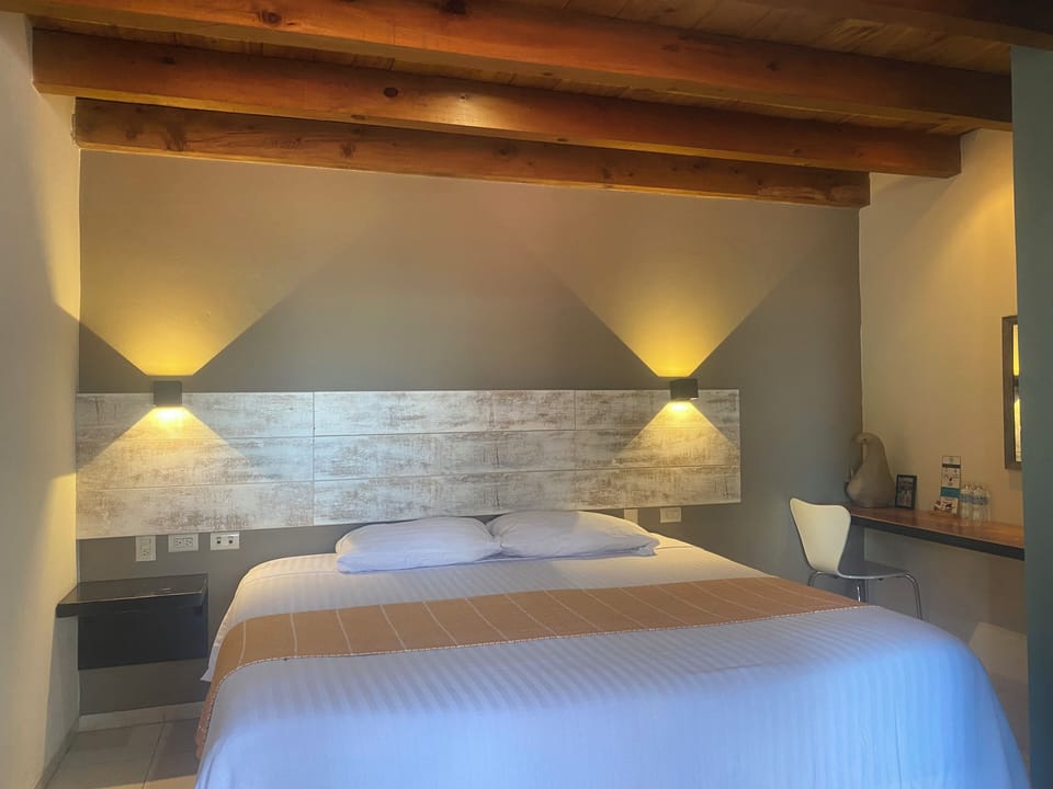 Standard Room, 1 King Bed | Cribs (free), WiFi (free)