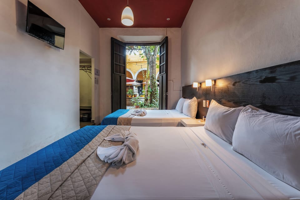 Double Room, 2 Double Beds | 1 bedroom, WiFi (free), bed sheets