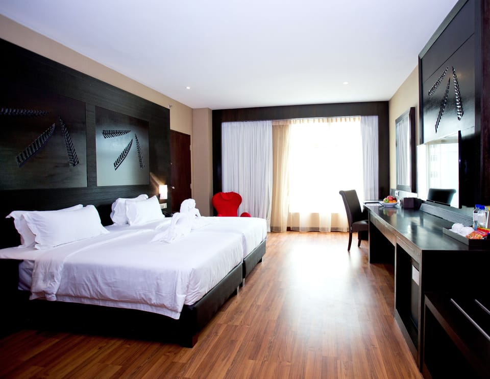 Family Connecting Room, 3 Bedrooms | Minibar, in-room safe, blackout drapes, iron/ironing board