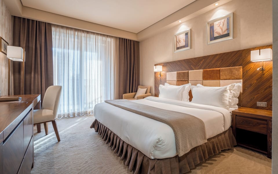 Frette Italian sheets, premium bedding, down comforters