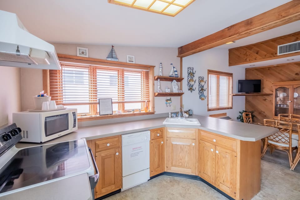 Family Condo | Private kitchen | Fridge, microwave, coffee/tea maker