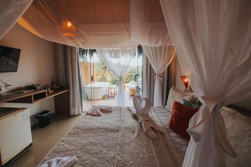 Luxo Piso Superior | Minibar, in-room safe, blackout drapes, free WiFi