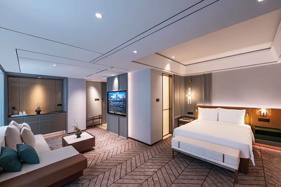 Suite, 1 King Bed, City View | Down comforters, minibar, in-room safe, desk