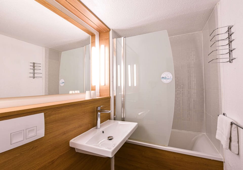 Eco-friendly toiletries, hair dryer, towels