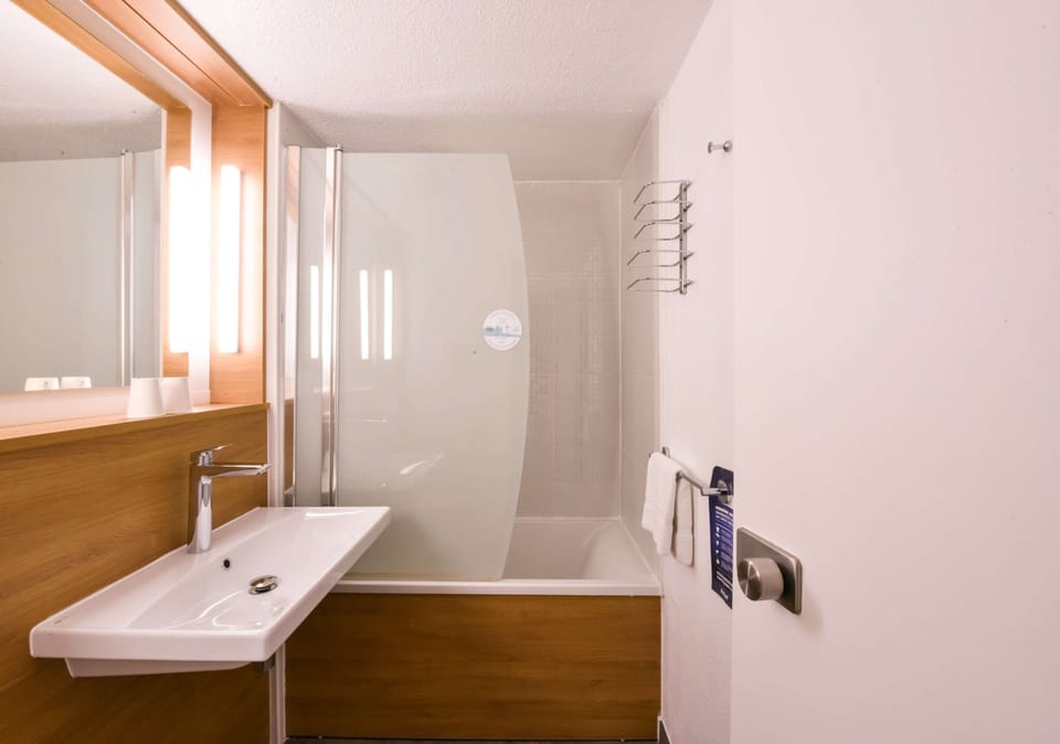 Eco-friendly toiletries, hair dryer, towels