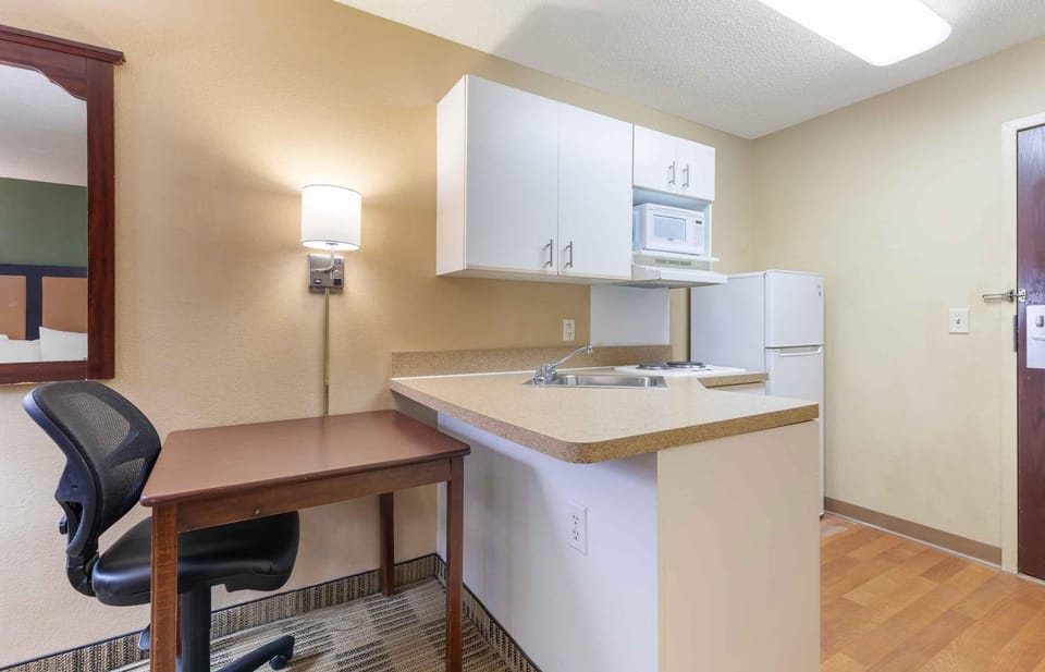 Studio, 1 Queen Bed, Non Smoking | Private kitchen | Coffee/tea maker, full-size fridge, microwave, stovetop